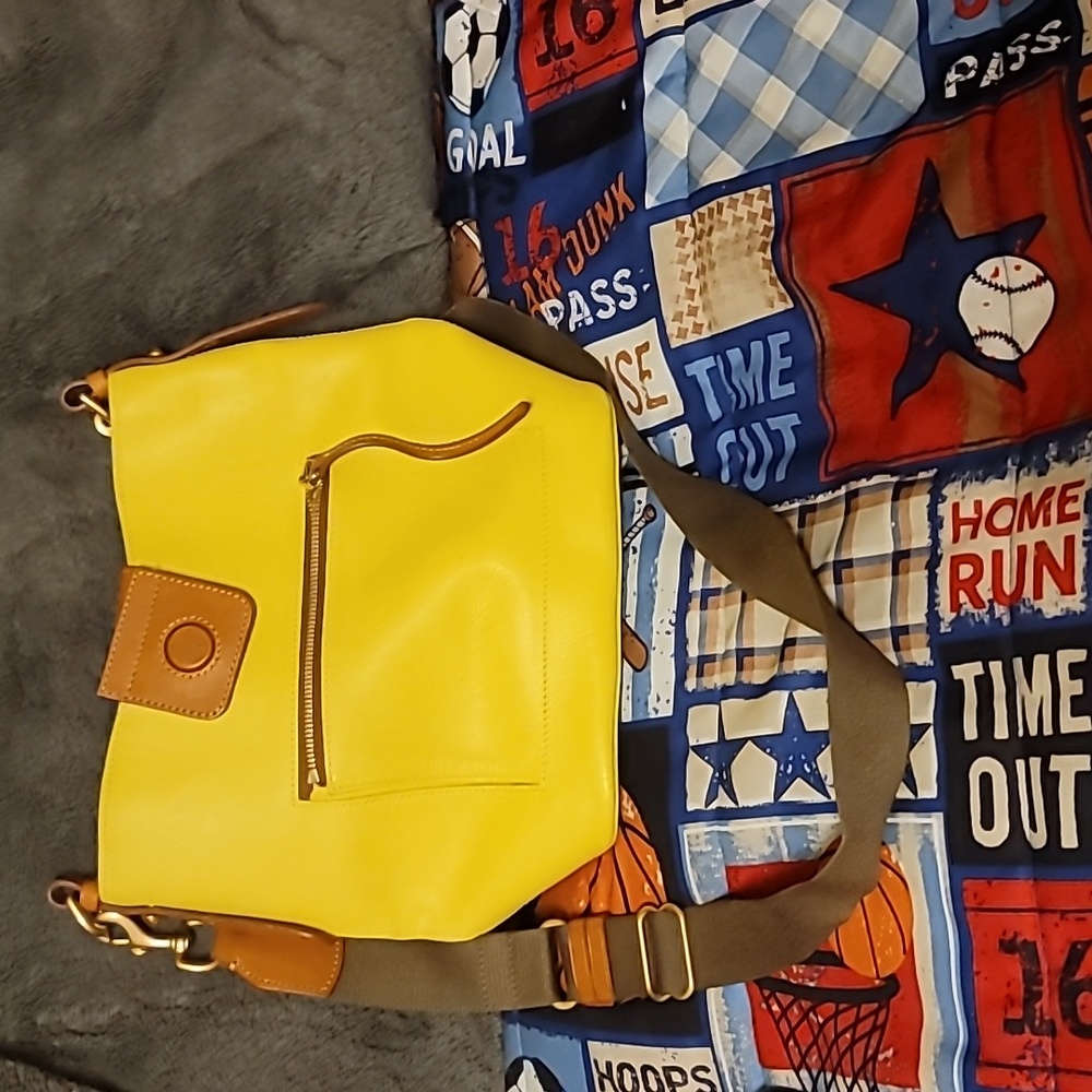 Yellow leather dooney and bourke crossbody/shoulder bag
